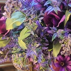 White ceramic purple silk flower arrangement